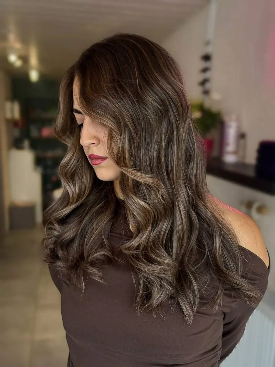 Réalisation d'une coiffure par Ellyhair
